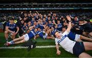 30 March 2024; The Laois team celebrate after winning the Allianz Football League Division 4 final match between Laois and Leitrim at Croke Park in Dublin. Photo by Ramsey Cardy/Sportsfile