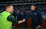 30 March 2024; Laois manager Justin McNulty, right, shakes hands with Leitrim manager Andy Moran after the Allianz Football League Division 4 final match between Laois and Leitrim at Croke Park in Dublin. Photo by Ramsey Cardy/Sportsfile