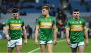 30 March 2024; Leitrim players, from left, Donal Casey, Adam Reynolds and Jamie McGreal after their side's defeat in the Allianz Football League Division 4 final match between Laois and Leitrim at Croke Park in Dublin. Photo by Shauna Clinton/Sportsfile