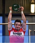 30 March 2024; Derry captain Cormac O'Doherty lifts the cup after the Allianz Hurling League Division 2B final match between Derry and Tyrone at the Derry GAA Centre of Excellence in Owenbeg, Derry. Photo by Ben McShane/Sportsfile