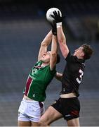 30 March 2024; Robbie Forde of Westmeath in action against Ryan McEvoy of Down during the Allianz Football League Division 3 final match between Down and Westmeath at Croke Park in Dublin. Photo by Ramsey Cardy/Sportsfile
