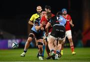 30 March 2024; Mike Haley of Munster knocks on as he is tackled by Mason Grady of Cardiff in the build up to a disallowed try during the United Rugby Championship match between Munster and Cardiff at Thomond Park in Limerick. Photo by Harry Murphy/Sportsfile