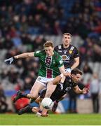 30 March 2024; Pierce Laverty of Down is tackled by Ray Connellan of Westmeath during the Allianz Football League Division 3 final match between Down and Westmeath at Croke Park in Dublin. Photo by Shauna Clinton/Sportsfile