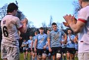 30 March 2024; UCD captain Bobby Sheehan leads his team off the field dejected after his side's defeat in the annual Men’s Rugby Colours match between Dublin University and UCD at College Park in Trinity College, Dublin. Photo by Sam Barnes/Sportsfile
