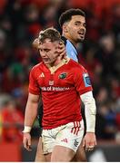 30 March 2024; Craig Casey of Munster is consoled by Ben Thomas of Cardiff after his misplaced pass led to the first Cardiff try during the United Rugby Championship match between Munster and Cardiff at Thomond Park in Limerick. Photo by Harry Murphy/Sportsfile