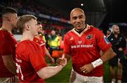 30 March 2024; Simon Zebo and Ethan Coughlan of Munster after their side's victory in the United Rugby Championship match between Munster and Cardiff at Thomond Park in Limerick. Photo by Harry Murphy/Sportsfile
