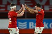 30 March 2024; Alex Kendellen, left, and Antoine Frisch of Munster after the United Rugby Championship match between Munster and Cardiff at Thomond Park in Limerick. Photo by Brendan Moran/Sportsfile