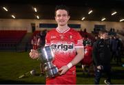 30 March 2024; Derry captain Cormac O'Doherty poses with the cup after his side's victory in the Allianz Hurling League Division 2B final match between Derry and Tyrone at the Derry GAA Centre of Excellence in Owenbeg, Derry. Photo by Ben McShane/Sportsfile