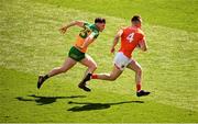 31 March 2024; Peter McGrane of Armagh in action against Luke McGlynn of Donegal during the Allianz Football League Division 2 Final match between Armagh and Donegal at Croke Park in Dublin. Photo by Ramsey Cardy/Sportsfile