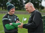 31 March 2024; Fermanagh manager Joe Baldwin, and Warwickshire manager Tony Joyce share a joke before the Allianz Hurling League Division 3B Final match between Fermanagh and Warwickshire at St Joseph's Park in Ederney, Fermanagh. Photo by Sam Barnes/Sportsfile
