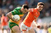 31 March 2024; Caolan McColgan of Donegal in action against Jarly Óg Burns of Armagh during the Allianz Football League Division 2 Final match between Armagh and Donegal at Croke Park in Dublin. Photo by Ramsey Cardy/Sportsfile