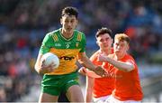 31 March 2024; Michael Langan of Donegal in action against Conor Turbitt of Armagh during the Allianz Football League Division 2 Final match between Armagh and Donegal at Croke Park in Dublin. Photo by Ramsey Cardy/Sportsfile