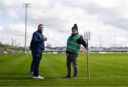 31 March 2024; Official Kevin Jordan, left, and groundsman Eamon Molloy share a joke before the Allianz Hurling League Division 2A Final match between Carlow and Laois at Netwatch Cullen Park in Carlow. Photo by Ben McShane/Sportsfile