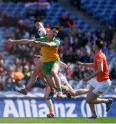 31 March 2024; Michael Langan of Donegal contests a high ball against Aaron McKay of Armagh during the Allianz Football League Division 2 Final match between Armagh and Donegal at Croke Park in Dublin. Photo by John Sheridan/Sportsfile