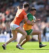 31 March 2024; Peadar Mogan of Donegal in action against Joe McElroy of Armagh during the Allianz Football League Division 2 Final match between Armagh and Donegal at Croke Park in Dublin. Photo by Ramsey Cardy/Sportsfile