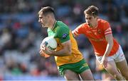 31 March 2024; Caolan McGonagle of Donegal in action against Andrew Murnin of Armagh during the Allianz Football League Division 2 Final match between Armagh and Donegal at Croke Park in Dublin. Photo by Ramsey Cardy/Sportsfile