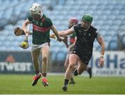 31 March 2024; John Heraty of Mayo in action against Finnian Cawley of Sligo during the Allianz Hurling League Division 3A Final match between Mayo and Sligo at Hastings Insurance MacHale Park in Castlebar, Mayo. Photo by Tyler Miller/Sportsfile