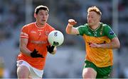 31 March 2024; Paddy Burns of Armagh in action against Oisín Gallen of Donegal during the Allianz Football League Division 2 Final match between Armagh and Donegal at Croke Park in Dublin. Photo by Ramsey Cardy/Sportsfile