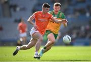 31 March 2024; Oisín Conaty of Armagh in action against Philip Doherty of Donegal during the Allianz Football League Division 2 Final match between Armagh and Donegal at Croke Park in Dublin. Photo by Ramsey Cardy/Sportsfile
