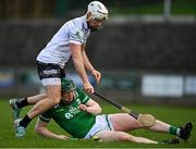 31 March 2024; Ben Corrigan of Fermanagh in action against Eamonn Brannigan of Warwickshire during the Allianz Hurling League Division 3B Final match between Fermanagh and Warwickshire at St Joseph's Park in Ederney, Fermanagh. Photo by Sam Barnes/Sportsfile