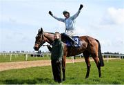 31 March 2024; Jockey Paul Townend celebrates on Jade De Grugy after winning the Irish Stallion Farms EBF Honeysuckle Mares Novice Hurdle on day two of the Fairyhouse Easter Festival at Fairyhouse Racecourse in Ratoath, Meath. Photo by Seb Daly/Sportsfile