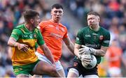 31 March 2024; Armagh goalkeeper Blaine Hughes in action against Peadar Mogan of Donegal during the Allianz Football League Division 2 Final match between Armagh and Donegal at Croke Park in Dublin. Photo by Piaras Ó Mídheach/Sportsfile