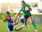 31 March 2024; Béibhinn Parsons of Ireland evades the tackle of Vittoria Ostuni Minuzzi of Italy during the Women's Six Nations Rugby Championship match between Ireland and Italy at the RDS Arena in Dublin. Photo by Harry Murphy/Sportsfile