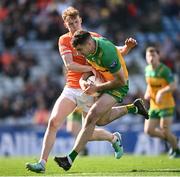 31 March 2024; Caolan McGonagle of Donegal in action against Conor Turbitt of Armagh during the Allianz Football League Division 2 Final match between Armagh and Donegal at Croke Park in Dublin. Photo by Ramsey Cardy/Sportsfile