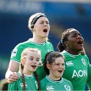 31 March 2024; Ireland captain Sam Monaghan and Linda Djougang of Ireland sing Amhrán na bhFiann before the Women's Six Nations Rugby Championship match between Ireland and Italy at the RDS Arena in Dublin. Photo by Harry Murphy/Sportsfile