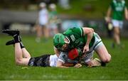 31 March 2024; Kelvin Magee of Warwickshire and Daniel Teague of Fermanagh tussle during the Allianz Hurling League Division 3B Final match between Fermanagh and Warwickshire at St Joseph's Park in Ederney, Fermanagh. Photo by Sam Barnes/Sportsfile