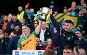 31 March 2024; Donegal joint-captains Ciarán Thompson, left, and Patrick McBrearty lift the trophy after the Allianz Football League Division 2 Final match between Armagh and Donegal at Croke Park in Dublin. Photo by Ramsey Cardy/Sportsfile