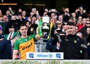 31 March 2024; Donegal joint-captains Ciarán Thompson, left, and Patrick McBrearty lift the cup after their side's victory in the Allianz Football League Division 2 Final match between Armagh and Donegal at Croke Park in Dublin. Photo by Piaras Ó Mídheach/Sportsfile