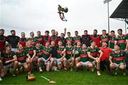 31 March 2024; Mayo players and staff celebrate wth the cup after their side's victory in the Allianz Hurling League Division 3A Final match between Mayo and Sligo at Hastings Insurance MacHale Park in Castlebar, Mayo. Photo by Tyler Miller/Sportsfile