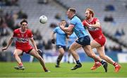 31 March 2024; Ciarán Kilkenny of Dublin in action against Conor Glass of Derry during the Allianz Football League Division 1 Final match between Dublin and Derry at Croke Park in Dublin. Photo by Ramsey Cardy/Sportsfile