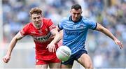 31 March 2024; Lachlan Murray of Derry in action against Colm Basquel of Dublin during the Allianz Football League Division 1 Final match between Dublin and Derry at Croke Park in Dublin. Photo by Piaras Ó Mídheach/Sportsfile