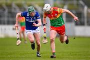 31 March 2024; Fiachra Fitzpatrick of Carlow in action against Diamaid Conway of Laois during the Allianz Hurling League Division 2A Final match between Carlow and Laois at Netwatch Cullen Park in Carlow. Photo by Ben McShane/Sportsfile