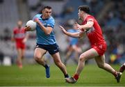 31 March 2024; Colm Basquel of Dublin in action against Padraig McGrogan of Derry during the Allianz Football League Division 1 Final match between Dublin and Derry at Croke Park in Dublin. Photo by Ramsey Cardy/Sportsfile