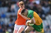 31 March 2024; Caolan McGonagle of Donegal in action against Conor Turbitt of Armagh during the Allianz Football League Division 2 Final match between Armagh and Donegal at Croke Park in Dublin. Photo by Ramsey Cardy/Sportsfile