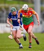 31 March 2024; Fiachra Fitzpatrick of Carlow in action against Diamaid Conway of Laois during the Allianz Hurling League Division 2A Final match between Carlow and Laois at Netwatch Cullen Park in Carlow. Photo by Ben McShane/Sportsfile