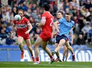 31 March 2024; Tom Lahiff of Dublin shoots to score Dublins first point in the 4th minute during the Allianz Football League Division 1 Final match between Dublin and Derry at Croke Park in Dublin. Photo by John Sheridan/Sportsfile