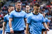 31 March 2024; Brian Fenton of Dublin, centre, with his team-mates in the parade before the Allianz Football League Division 1 Final match between Dublin and Derry at Croke Park in Dublin. Photo by Piaras Ó Mídheach/Sportsfile