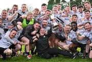 31 March 2024; The Warwickshire team, including Warwickshire manager Tony Joyce, centre, celebrate with the cup after their side's victory in the Allianz Hurling League Division 3B Final match between Fermanagh and Warwickshire at St Joseph's Park in Ederney, Fermanagh. Photo by Sam Barnes/Sportsfile