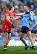 31 March 2024; Brendan Rogers of Derry tussles with Brian Fenton of Dublin during the Allianz Football League Division 1 Final match between Dublin and Derry at Croke Park in Dublin. Photo by John Sheridan/Sportsfile