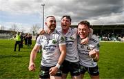 31 March 2024; Warwickshire players, from left, Oisín Slattery, David Devine and Dan Lowry celebrate after their side's victory in the Allianz Hurling League Division 3B Final match between Fermanagh and Warwickshire at St Joseph's Park in Ederney, Fermanagh. Photo by Sam Barnes/Sportsfile