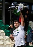 31 March 2024; Colm Shalvey of Warwickshire lifts the cup after his side's victory in the Allianz Hurling League Division 3B Final match between Fermanagh and Warwickshire at St Joseph's Park in Ederney, Fermanagh. Photo by Sam Barnes/Sportsfile