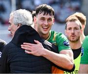 31 March 2024; Michael Langan of Donegal celebrates with his manager Jim McGuinness after their side's victory in the Allianz Football League Division 2 Final match between Armagh and Donegal at Croke Park in Dublin. Photo by Piaras Ó Mídheach/Sportsfile