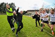31 March 2024; Warwickshire manager Tony Joyce, second from left, celebrates with players and support staff at the final whistle after their side's victory in the Allianz Hurling League Division 3B Final match between Fermanagh and Warwickshire at St Joseph's Park in Ederney, Fermanagh. Photo by Sam Barnes/Sportsfile