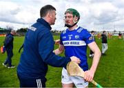 31 March 2024; Padraig Delaney of Laois celebrates with Laois manager Willie Maher after the Allianz Hurling League Division 2A Final match between Carlow and Laois at Netwatch Cullen Park in Carlow. Photo by Ben McShane/Sportsfile