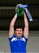 31 March 2024; Laois captain Aaron Dunphy lifts the cup after the Allianz Hurling League Division 2A Final match between Carlow and Laois at Netwatch Cullen Park in Carlow. Photo by Ben McShane/Sportsfile