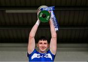 31 March 2024; Laois captain Aaron Dunphy lifts the cup after the Allianz Hurling League Division 2A Final match between Carlow and Laois at Netwatch Cullen Park in Carlow. Photo by Ben McShane/Sportsfile